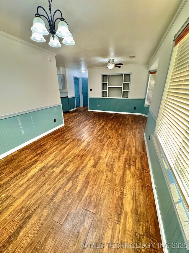 5101 S Spruce Dr, Sand Springs, OK 74063 - unfurnished room featuring visible vents, baseboards, wood finished floors, and ceiling fan with notable chandelier