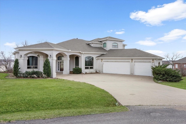 11746 Giorgio Dr, Skiatook, OK 74070 - view of front of house featuring a front yard, driveway, stucco siding, and an attached garage