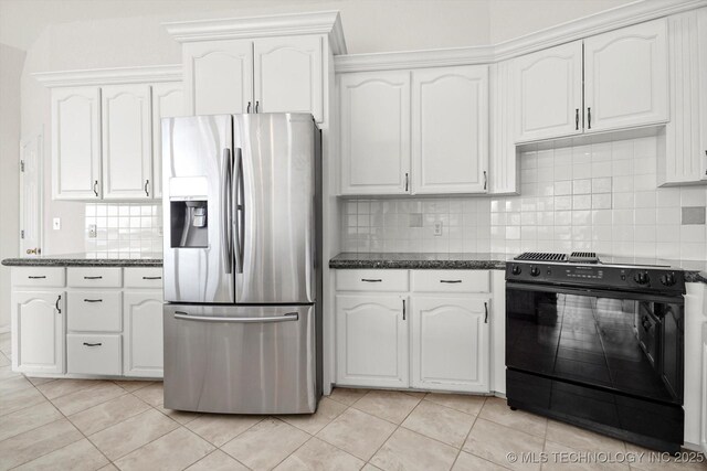 11746 Giorgio Dr, Skiatook, OK 74070 - kitchen with black electric range oven, decorative backsplash, stainless steel fridge, and light tile patterned flooring