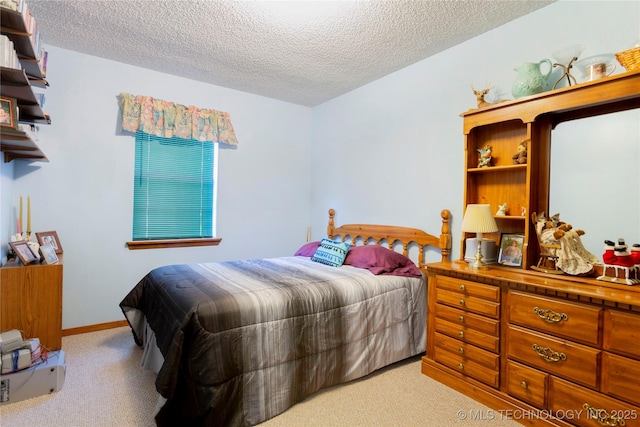 612 W Circle Dr, Broken Bow, OK 74728 - bedroom featuring light carpet and a textured ceiling