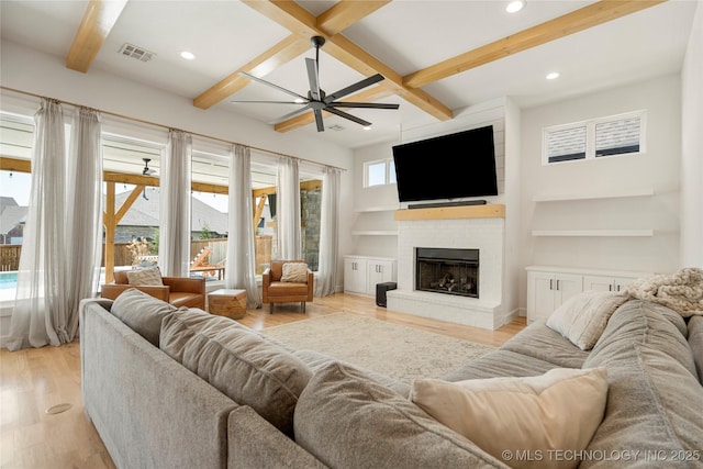 2996 E 142nd Ct S, Bixby, OK 74008 - living room featuring recessed lighting, light wood-style flooring, a brick fireplace, visible vents, and ceiling fan