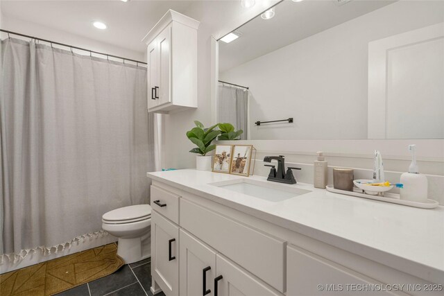 2996 E 142nd Ct S, Bixby, OK 74008 - full bathroom with a shower with shower curtain, toilet, recessed lighting, vanity, and tile patterned floors