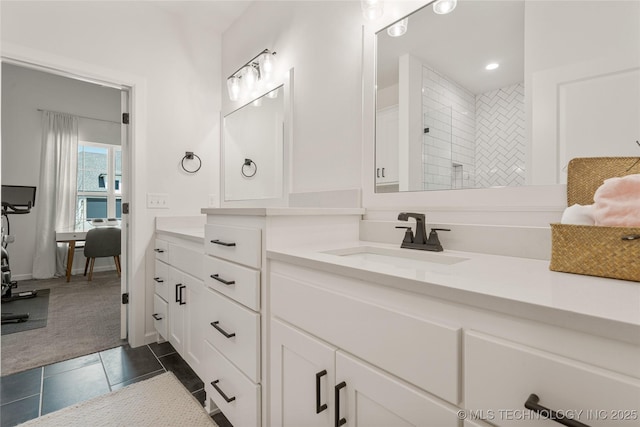 2996 E 142nd Ct S, Bixby, OK 74008 - ensuite bathroom featuring tile patterned floors, a tile shower, recessed lighting, and vanity