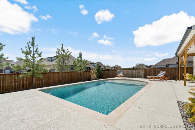 2996 E 142nd Ct S, Bixby, OK 74008 - view of swimming pool with a patio area, a fenced backyard, a fenced in pool, and a residential view