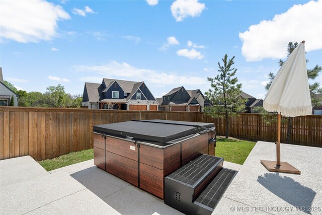 2996 E 142nd Ct S, Bixby, OK 74008 - view of patio featuring a fenced backyard and a hot tub