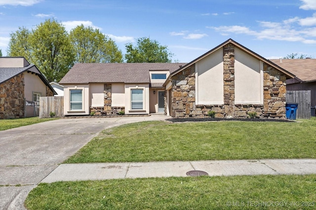 12939 E 34th St, Tulsa, OK 74134 - mid-century modern home featuring driveway, stucco siding, and stone siding