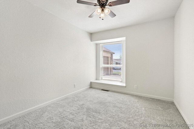 12939 E 34th St, Tulsa, OK 74134 - carpeted empty room with visible vents, baseboards, and a ceiling fan