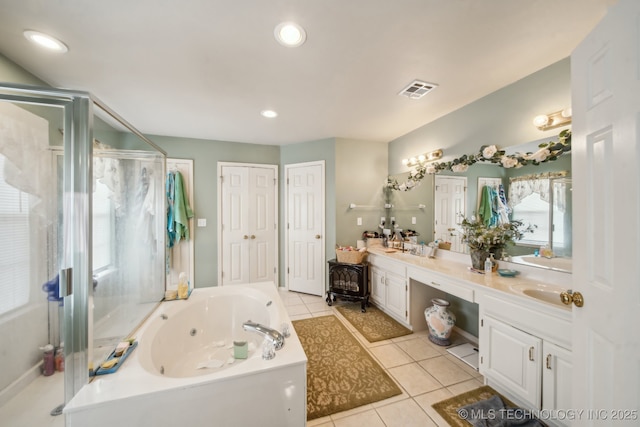4932 W Commercial St, Broken Arrow, OK 74012 - full bath with tile patterned flooring, a stall shower, a tub with jets, double vanity, and recessed lighting