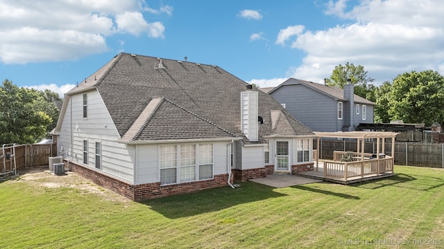 4932 W Commercial St, Broken Arrow, OK 74012 - rear view of house featuring a wooden deck, a chimney, roof with shingles, and brick siding