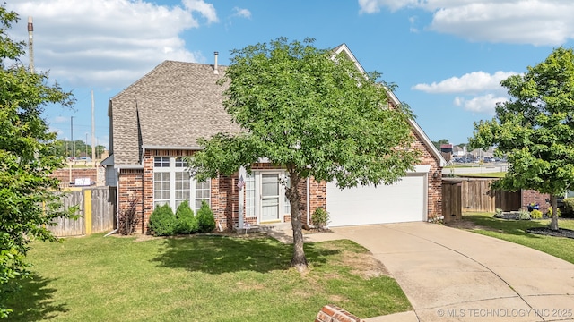 4932 W Commercial St, Broken Arrow, OK 74012 - view of front of property with brick siding, driveway, roof with shingles, and a garage