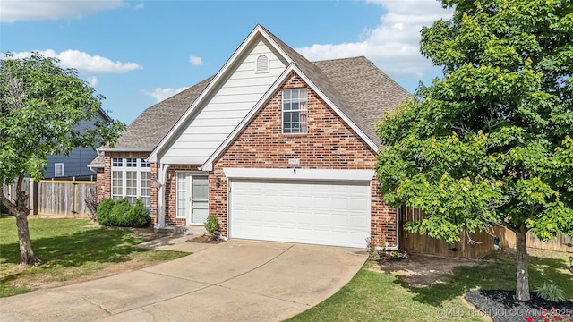 4932 W Commercial St, Broken Arrow, OK 74012 - view of front facade with brick siding, driveway, a shingled roof, and an attached garage