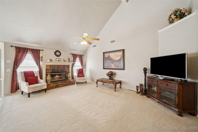 4932 W Commercial St, Broken Arrow, OK 74012 - carpeted living area featuring ceiling fan, healthy amount of natural light, a brick fireplace, and high vaulted ceiling