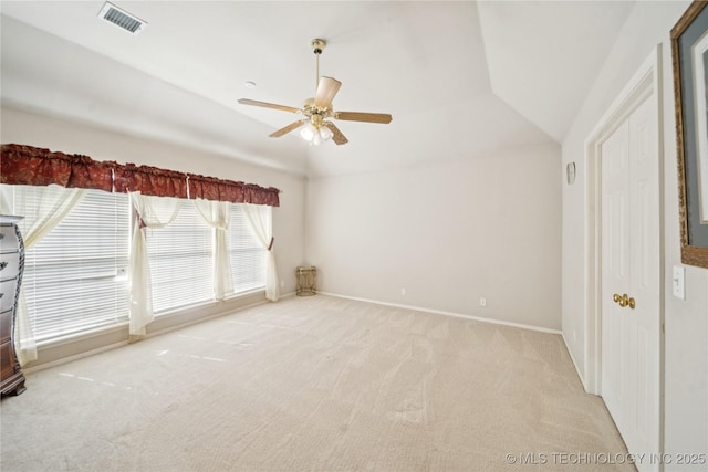 4932 W Commercial St, Broken Arrow, OK 74012 - unfurnished bedroom featuring carpet, vaulted ceiling, baseboards, and a ceiling fan