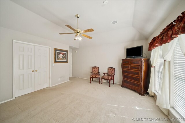 4932 W Commercial St, Broken Arrow, OK 74012 - living area with a ceiling fan, lofted ceiling, carpet floors, and baseboards