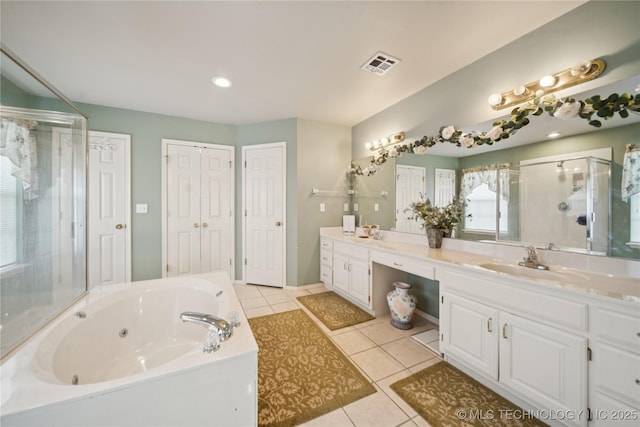 4932 W Commercial St, Broken Arrow, OK 74012 - bathroom with double vanity, a shower stall, tile patterned floors, and a whirlpool tub