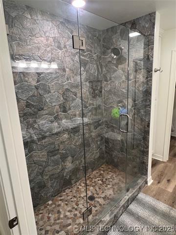 2241 231st St, Buffalo Valley, OK 74571 - full bath featuring a stall shower and wood finished floors