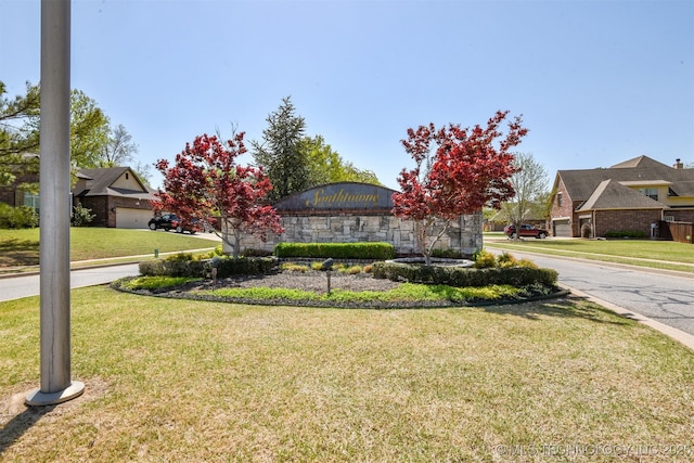 7204 S Sycamore Ave, Broken Arrow, OK 74011 - view of property hidden behind natural elements featuring a front lawn