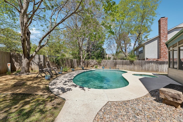 10126 S Granite Ave, Tulsa, OK 74137 - view of swimming pool with a fenced backyard, a patio area, and an in-ground hot tub