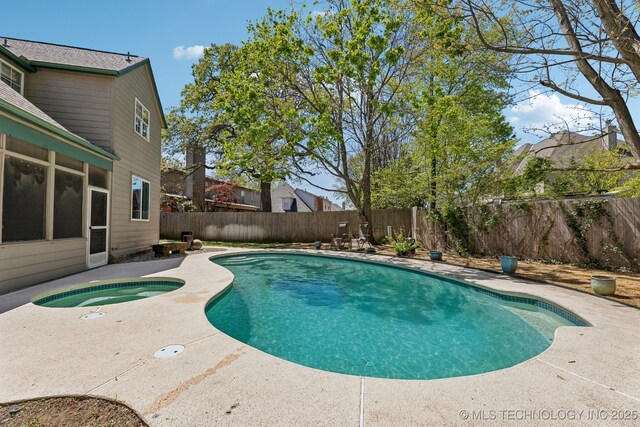 10126 S Granite Ave, Tulsa, OK 74137 - view of swimming pool featuring a fenced backyard, an in-ground hot tub, a patio area, and a sunroom