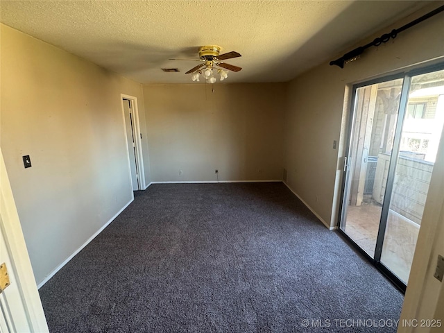 unfurnished room featuring baseboards, a ceiling fan, dark colored carpet, and a textured ceiling