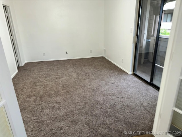 6524 S Memorial Dr Unit 16E, Tulsa, OK 74133 - empty room featuring carpet flooring