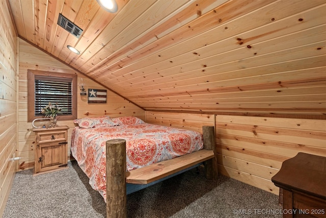 carpeted bedroom featuring visible vents, wood walls, vaulted ceiling, and wood ceiling
