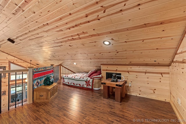 unfurnished bedroom featuring wood walls, vaulted ceiling, wooden ceiling, and wood finished floors