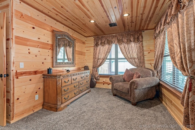 living area featuring wooden walls, carpet flooring, recessed lighting, and wooden ceiling