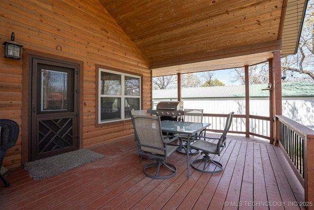 sunroom / solarium with outdoor dining space