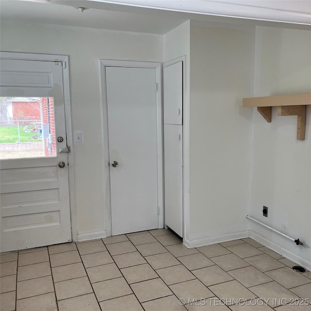 clothes washing area with laundry area and electric dryer hookup