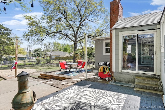 view of patio / terrace with fence