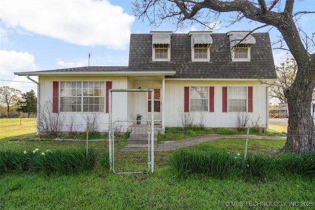 14531 S 107th W Ave, Sapulpa, OK 74066 - view of front of house featuring roof with shingles, mansard roof, and a front lawn