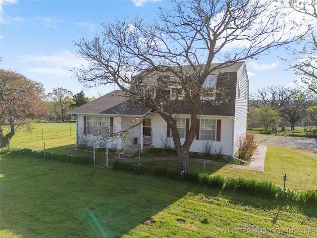 14531 S 107th W Ave, Sapulpa, OK 74066 - colonial inspired home featuring a gambrel roof, a shingled roof, and a front lawn
