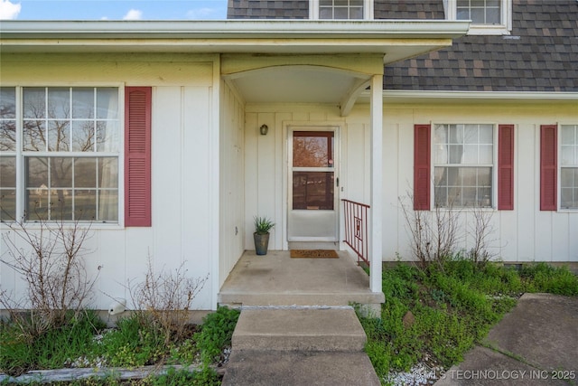 14531 S 107th W Ave, Sapulpa, OK 74066 - view of exterior entry featuring board and batten siding and a shingled roof