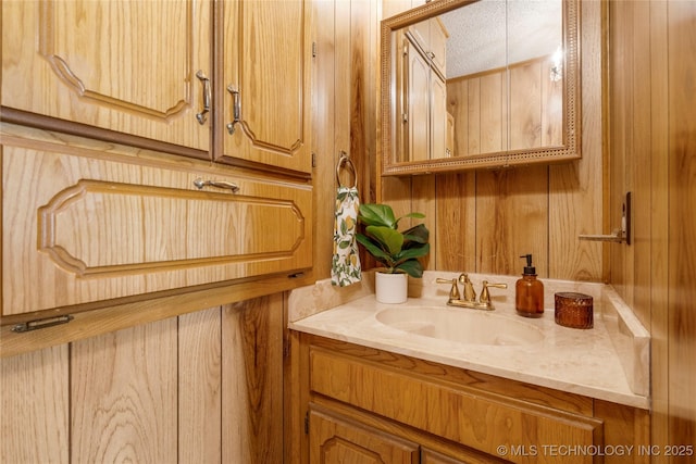 14531 S 107th W Ave, Sapulpa, OK 74066 - bathroom featuring wood walls and vanity
