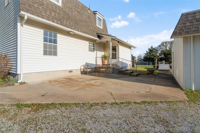 14531 S 107th W Ave, Sapulpa, OK 74066 - back of property featuring a patio, mansard roof, and a shingled roof