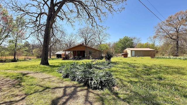84936 S 4612th Rd, Stilwell, OK 74960 - view of grassy yard with an outbuilding