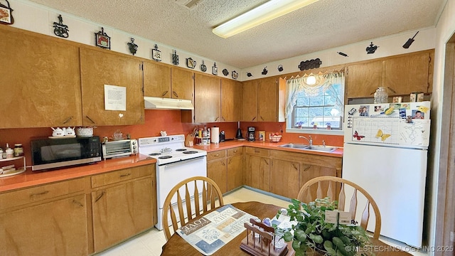 84936 S 4612th Rd, Stilwell, OK 74960 - kitchen featuring white appliances, a sink, under cabinet range hood, a textured ceiling, and light countertops