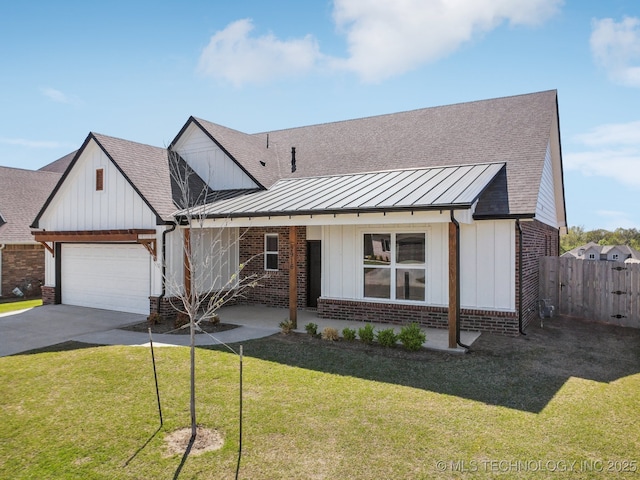 2916 S 8th St, Broken Arrow, OK 74012 - view of front of property with concrete driveway, brick siding, a standing seam roof, board and batten siding, and a garage