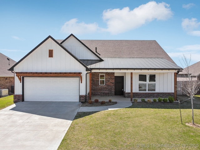 2916 S 8th St, Broken Arrow, OK 74012 - modern inspired farmhouse featuring brick siding, concrete driveway, board and batten siding, and a garage