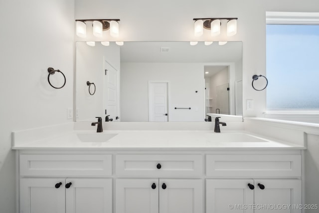2916 S 8th St, Broken Arrow, OK 74012 - bathroom featuring double vanity and a shower