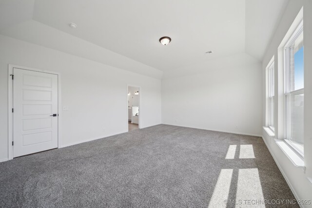 2916 S 8th St, Broken Arrow, OK 74012 - empty room with carpet flooring and vaulted ceiling