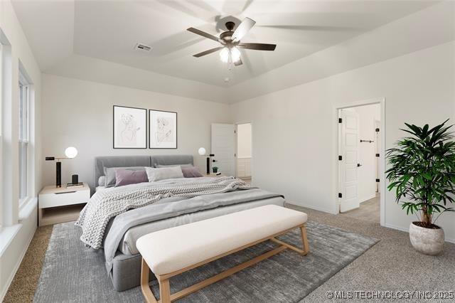 2916 S 8th St, Broken Arrow, OK 74012 - bedroom featuring a raised ceiling, carpet, and a ceiling fan