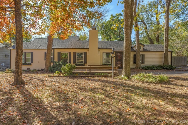 3004 E 49th St, Tulsa, OK 74105 - ranch-style house with a wooden deck and roof with shingles