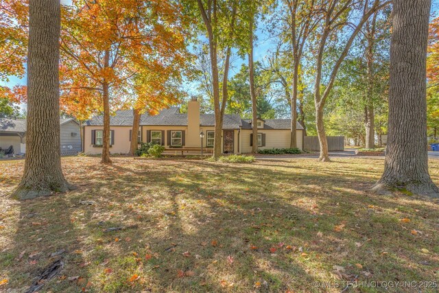 3004 E 49th St, Tulsa, OK 74105 - view of front of home featuring a chimney and a front lawn