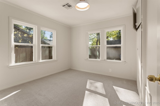 3004 E 49th St, Tulsa, OK 74105 - empty room with visible vents, baseboards, crown molding, and carpet floors