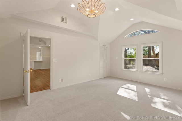 3004 E 49th St, Tulsa, OK 74105 - unfurnished bedroom with visible vents, an inviting chandelier, carpet, recessed lighting, and vaulted ceiling