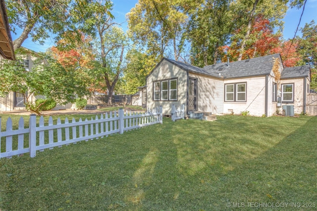 3004 E 49th St, Tulsa, OK 74105 - exterior space featuring cooling unit, a yard, and a fenced backyard