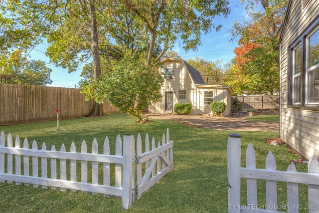 3004 E 49th St, Tulsa, OK 74105 - view of yard with an outbuilding and fence private yard