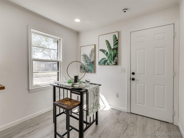 1809 N Delaware Pl, Tulsa, OK 74110 - entryway featuring light wood-style floors and baseboards